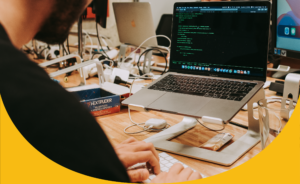 image of a man working with a PC