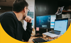 image of a man working with a PC